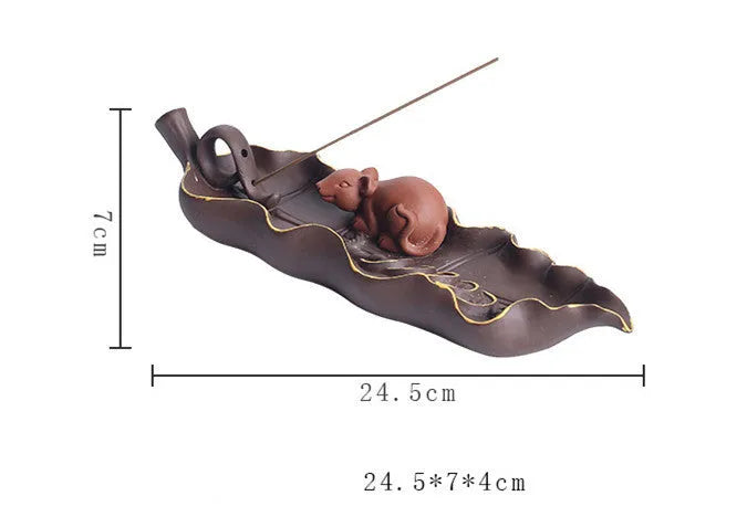 Purple clay ceramic lying incense burner with golden rat design for incense sticks
