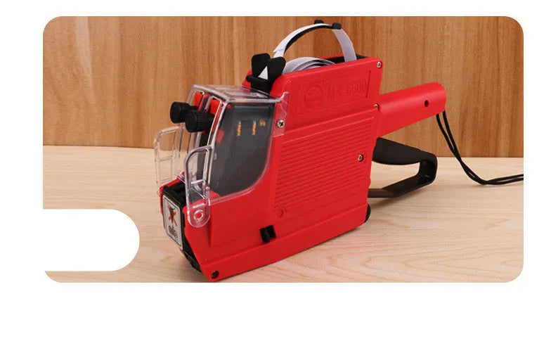 Blue manual handheld pricing machine with ink roller and paper rolls for supermarket labelling.
