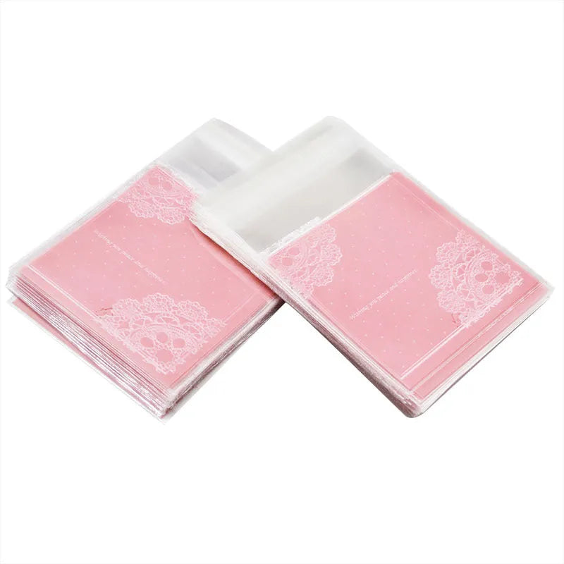 Pink self-adhesive plastic packaging bag for handmade soap, shown with dimensions 7cm by 7cm.