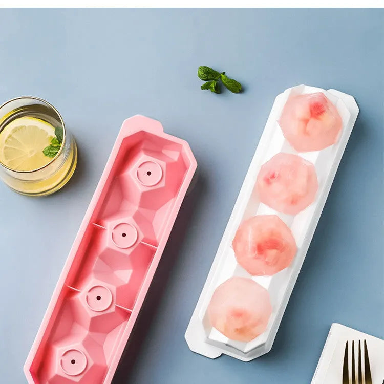 Silicone ice tray for making large ice hockey artifacts and round or pentagon ice shapes in various colours.