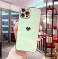 White TPU iPhone case with a love design shown on an iPhone smartphone