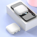 Compact black mini power bank with LED flashlight showing size scale