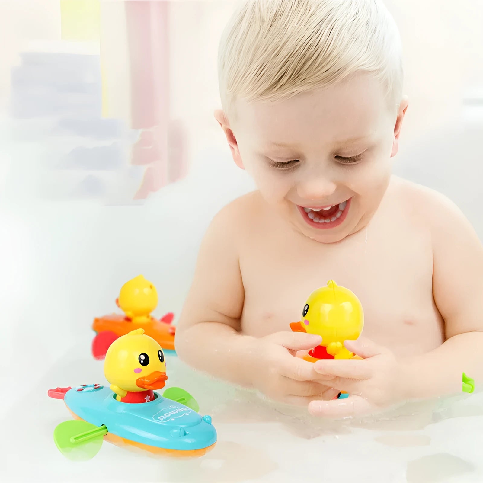 Yellow plastic wind-up swimming bath toys for children floating in water