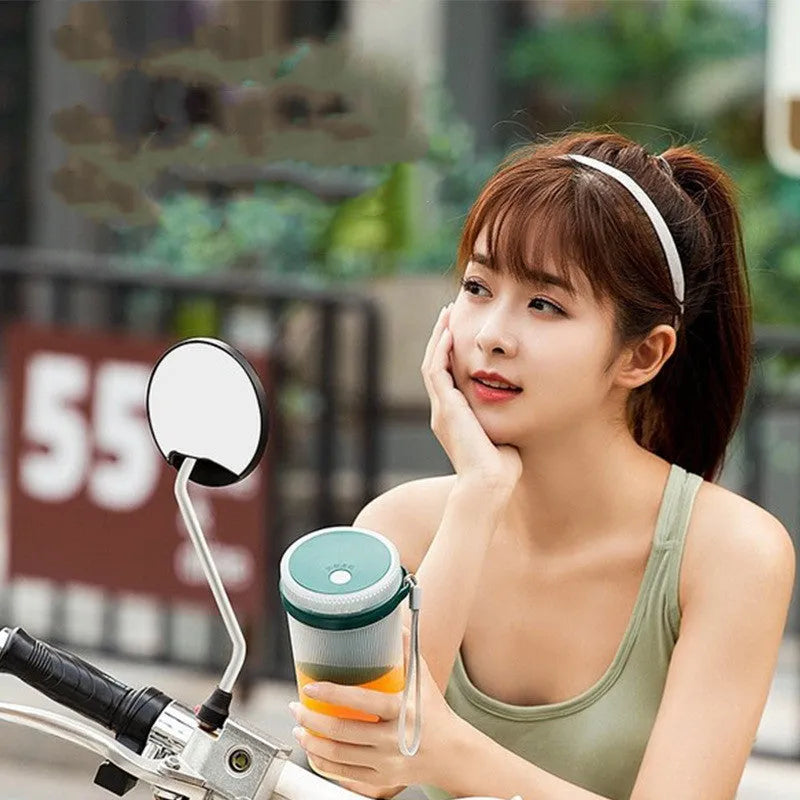 Portable USB rechargeable electric juicer cup in pink or green with 400ml capacity