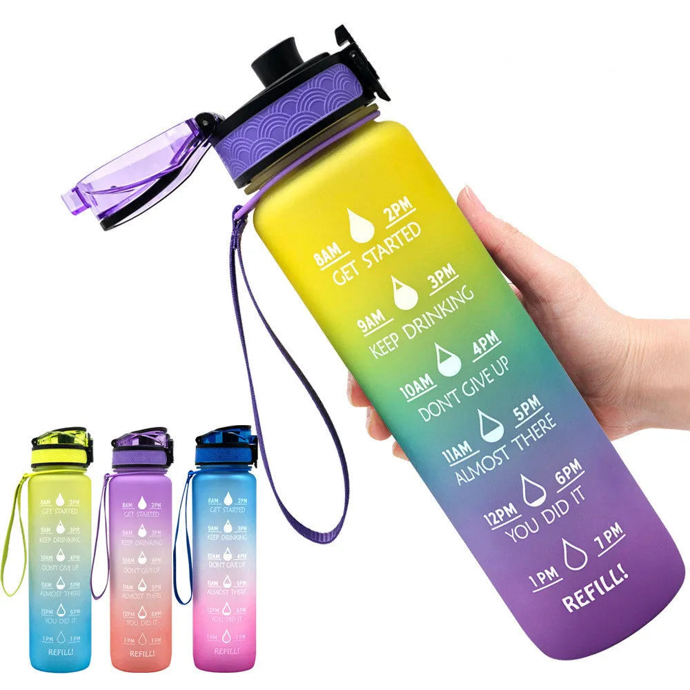 Blue and red gradient 1 litre Tritan sports water bottle with time markers and flip-top lid