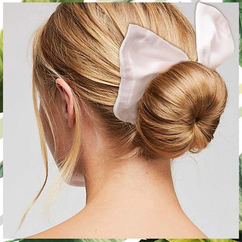 Natural colour cotton headband with a woven texture and a central bowknot.