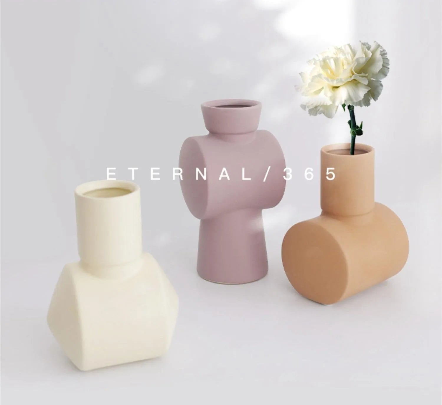 Nordic style Morandi ceramic vase with hammer texture in beige, brown, or purple colours.