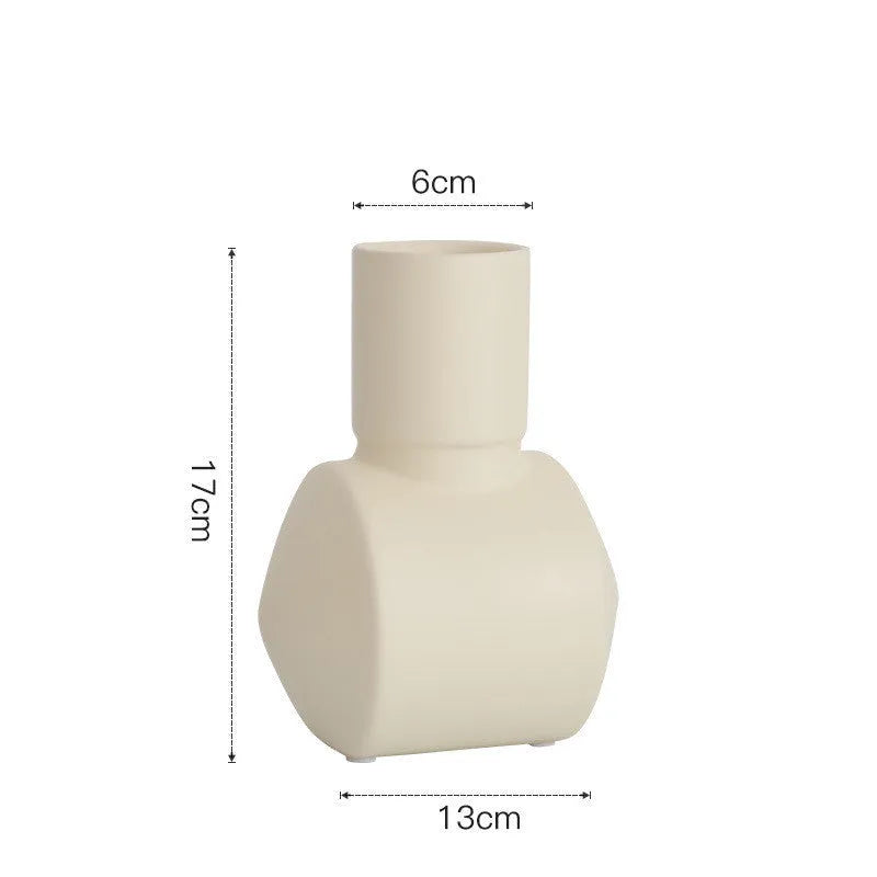 Nordic style Morandi ceramic vase with hammer texture in beige, brown, or purple colours.