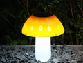 Solar mushroom ground plug light for garden landscape with ground spike installation