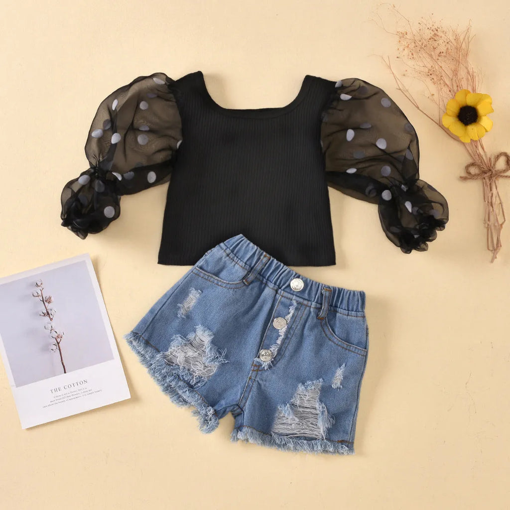 Black children's two-piece suit with striped top, mesh sleeves, and ripped denim shorts.