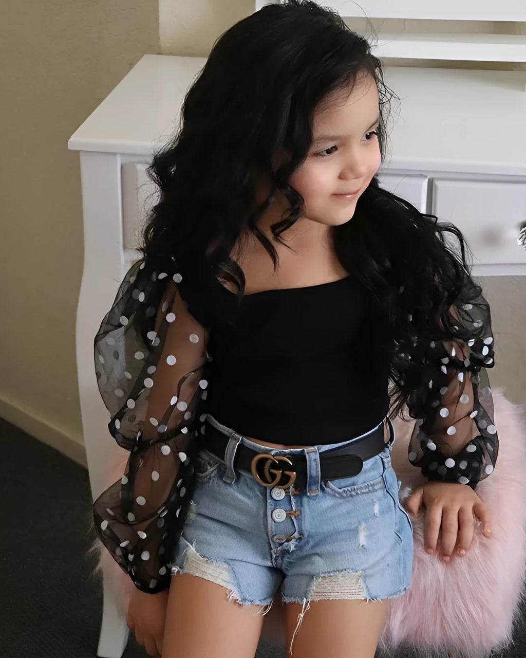 Black children's two-piece suit with striped top, mesh sleeves, and ripped denim shorts.