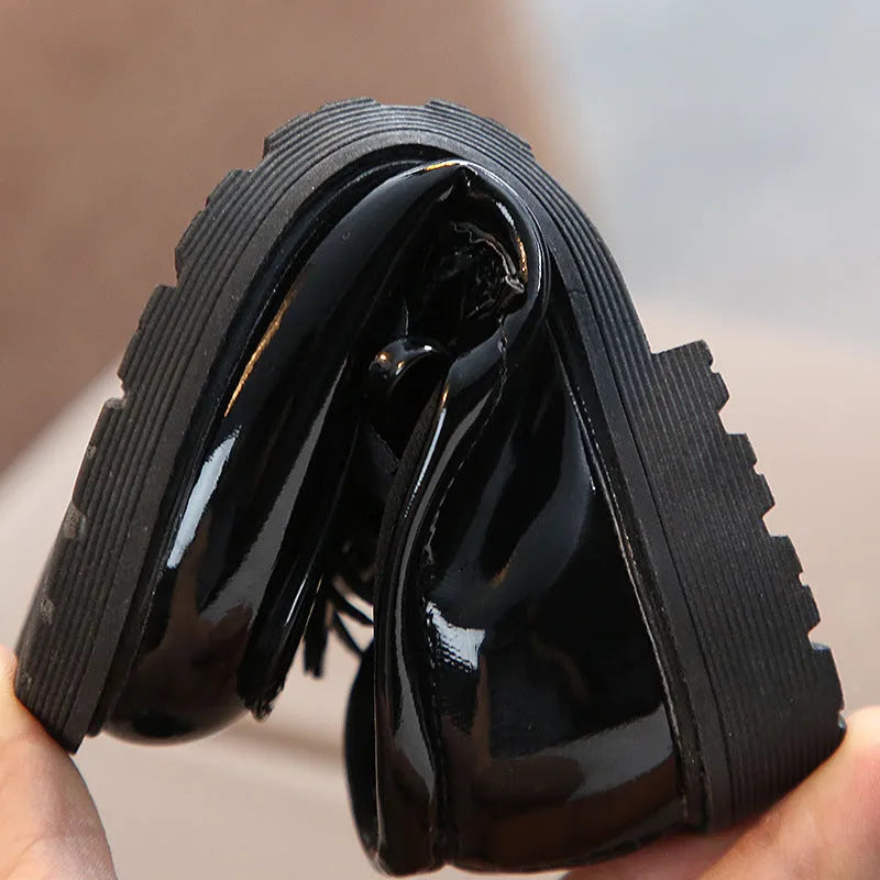 Childrens vintage synthetic leather sneakers in brown with car suture detailing, low-top design
