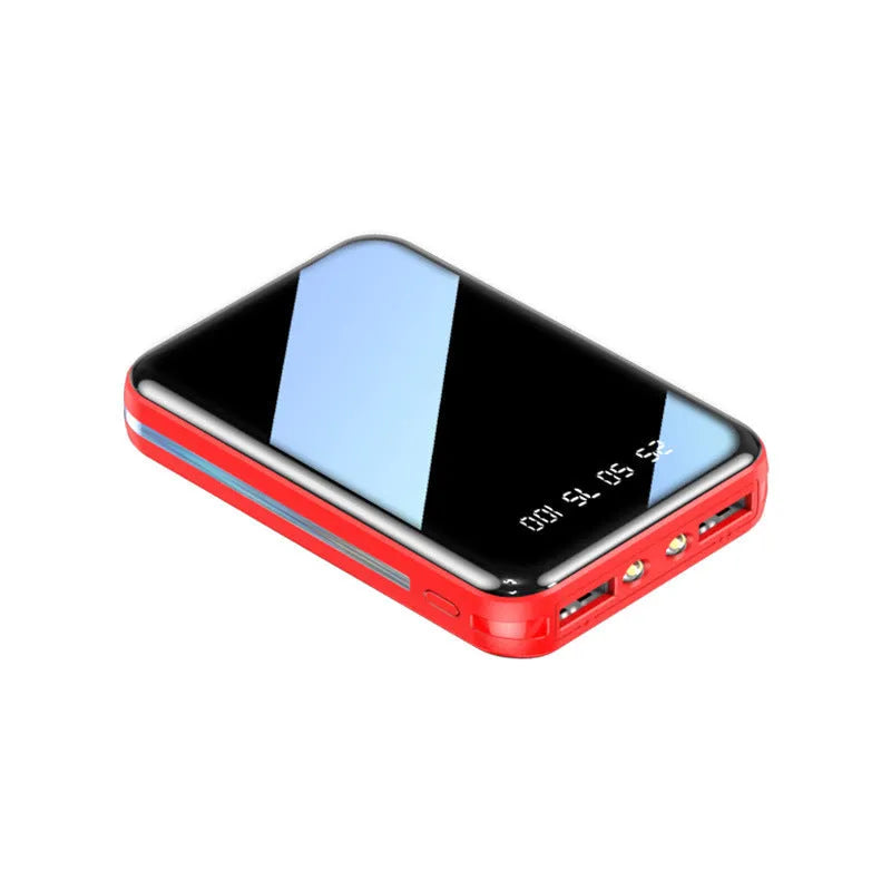Compact white plastic power bank with digital display showing battery percentage, featuring two USB ports.
