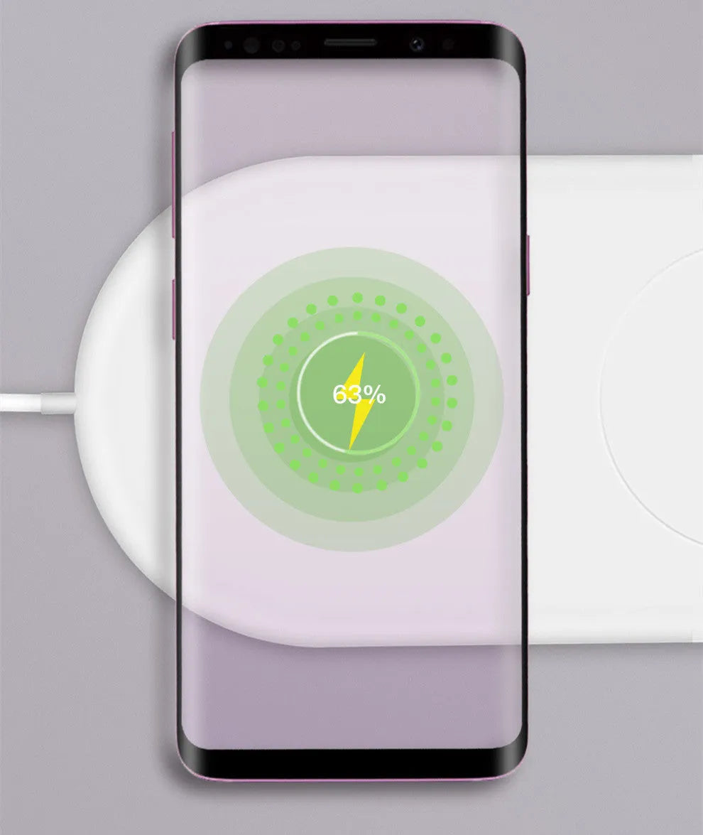 Simple white dual wireless fast charger for two mobile phones on a table