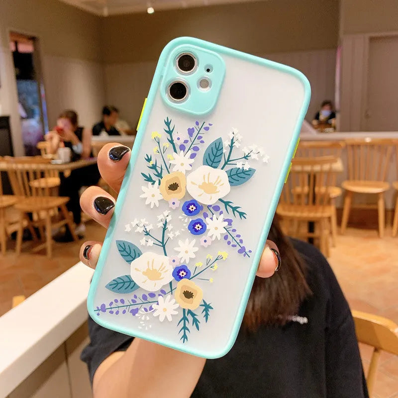 Pink lavender matte frame iPhone case with cartoon floral design on TPU back cover.