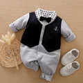 Gentleman's style long-sleeved cotton baby romper for boys shown in a neutral colour.