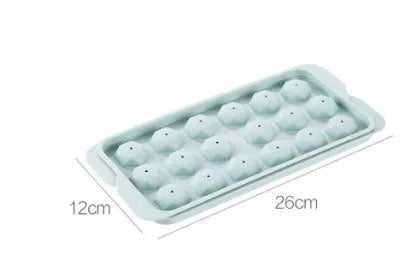 Sky blue and pink 3D round ice cube moulds with spherical cavities