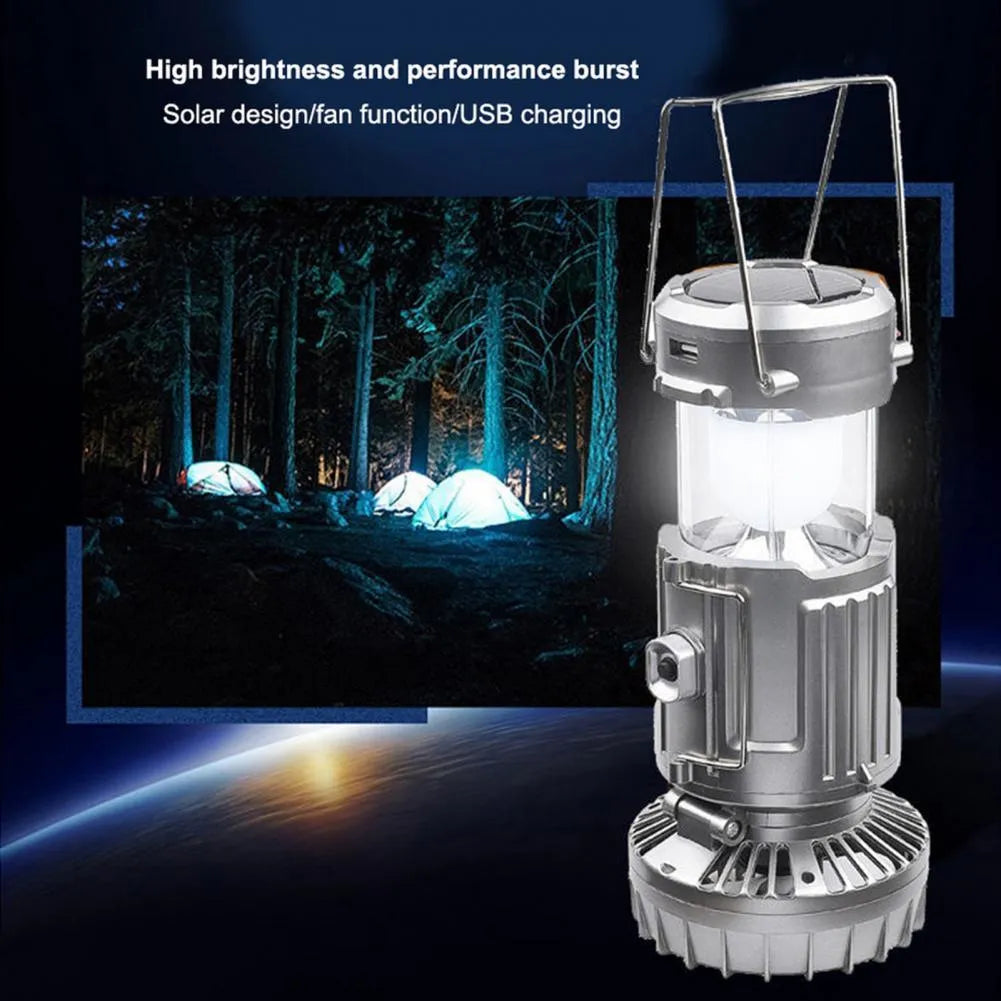 Solar electric fan lantern with waterproof casing and LED light in silver colour for camping use