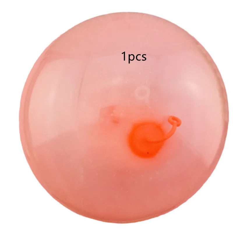 Large pink, yellow, green, and blue inflatable TPR bounce balls in different sizes.