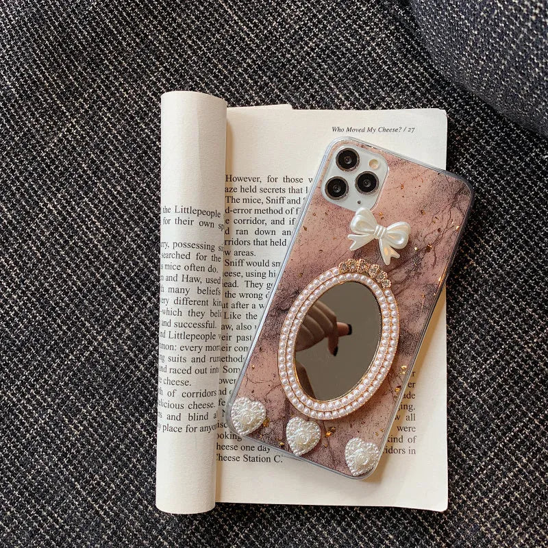 Brown marble pattern iPhone case with bowknot rhinestone mirror design on silicone protective cover