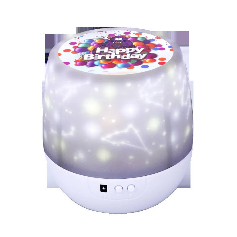 Cartoon-style Bluetooth starry sky projector lamp showing constellation projection on ceiling.