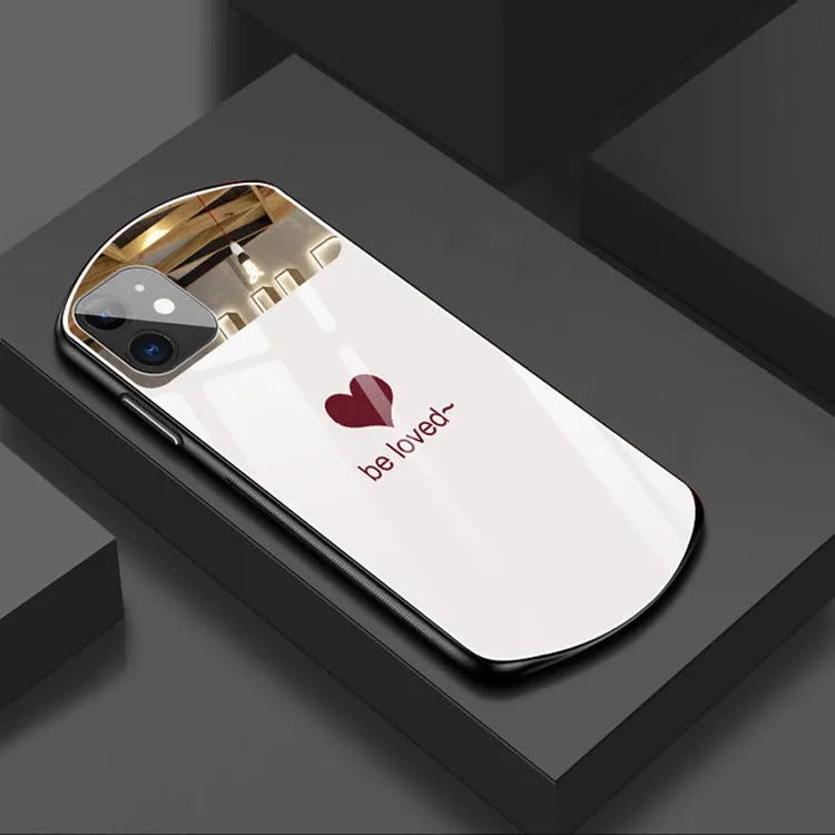 Love Makeup text design mirror back cover for iPhone in black, white, pink, and wine red.