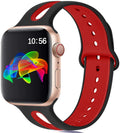Silicone Apple Watch strap with 6-hole sport loop in two-tone colours on a watch