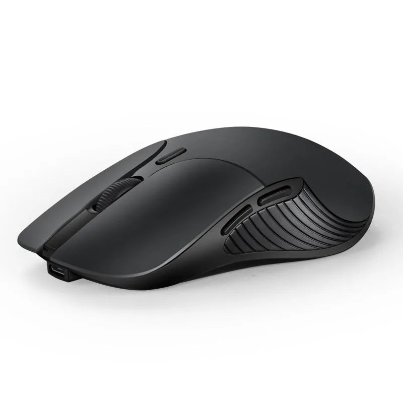 Blue wireless computer mouse with voice control and translation functions on a desk.