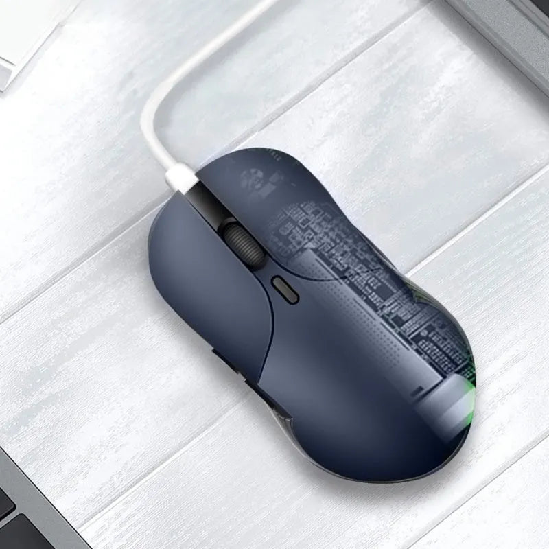 Blue wireless computer mouse with voice control and translation functions on a desk.
