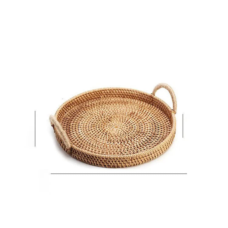 Round handwoven rattan storage basket with wooden handle in three different sizes for home organisation