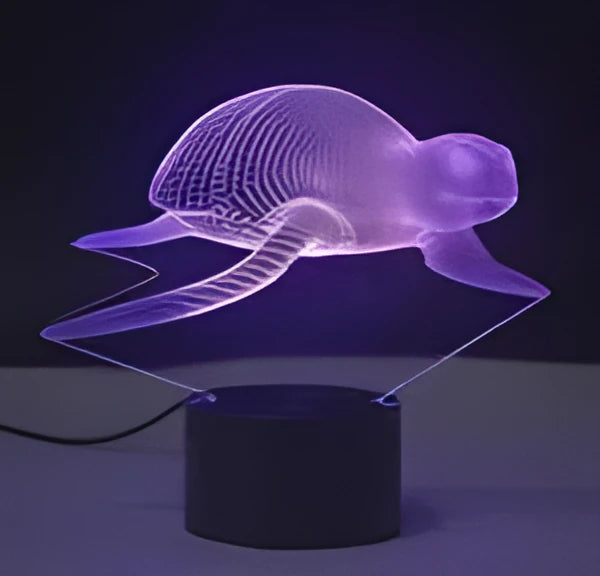 Colourful LED 3D table lamp with touch controls and remote on wooden desk