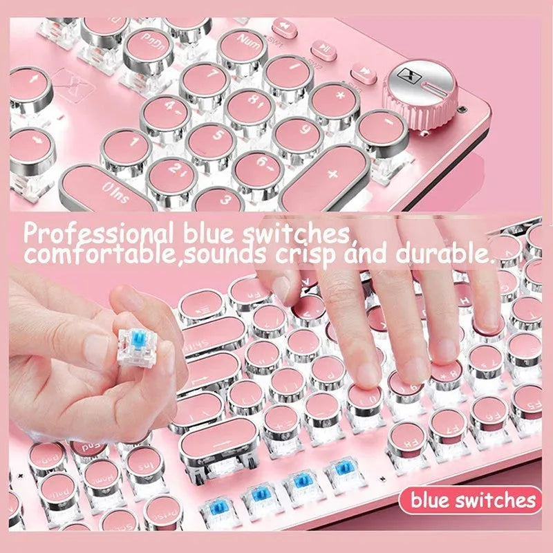 Pink and silver mechanical keyboard with green switches and matching wireless mouse on a desk.