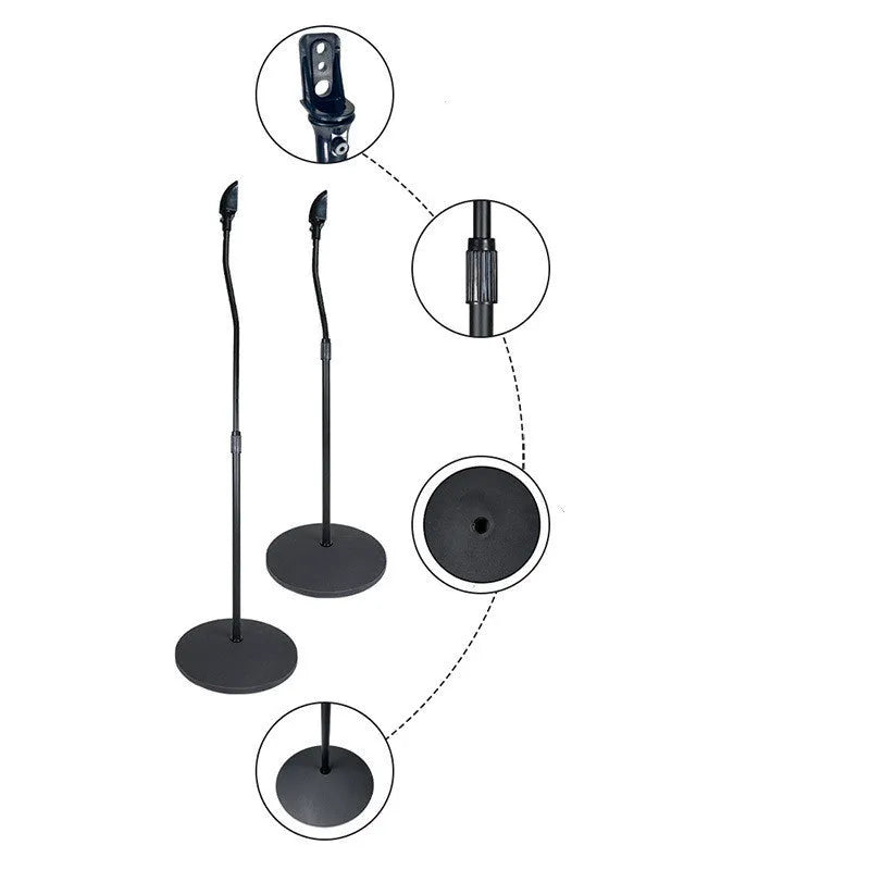 Black tripod speaker stand holding a bookshelf satellite speaker on its hanger rack.