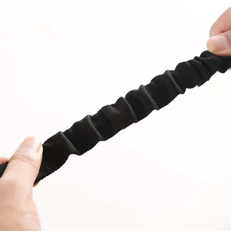 Black nylon pet vehicle retractable safety rope with metal buckle, 53-74cm length, on car seat