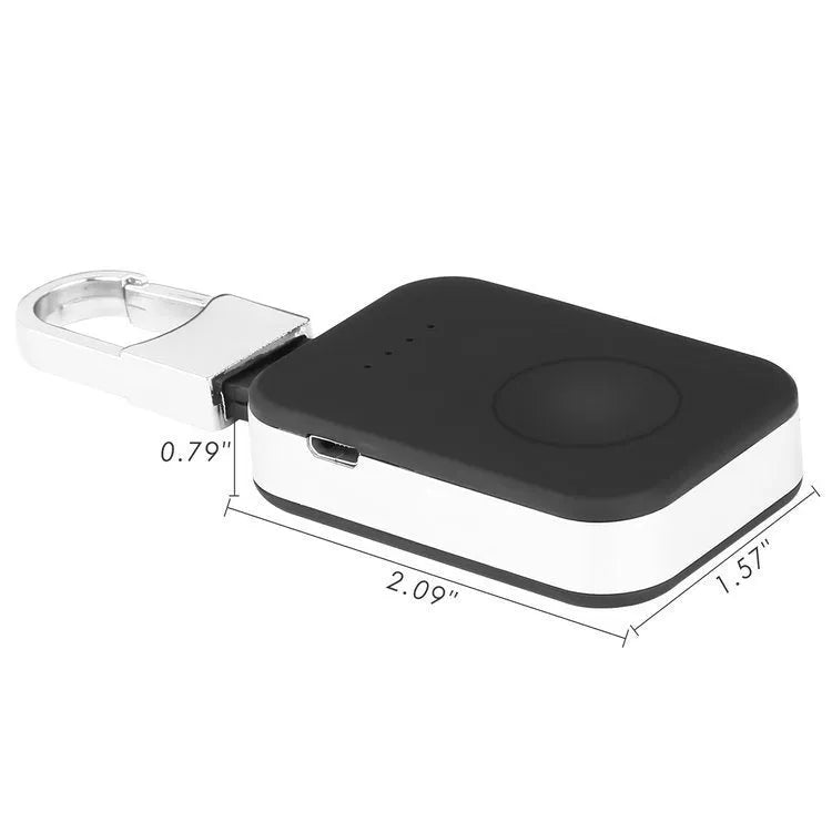 Black Apple Watch wireless charging power bank on a keychain, showing compact size.