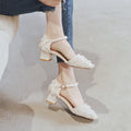 Women's apricot suede D'Orsay flats with an ankle strap and a low rubber sole.