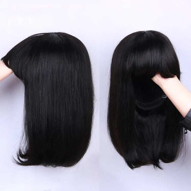 Unice machine-made human hair wig in black with 10-inch short to medium length style.