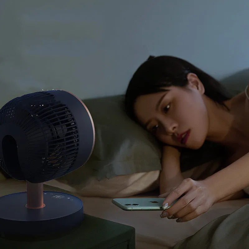 Emmett folding telescopic air circulation fan with remote control on floor in dark green
