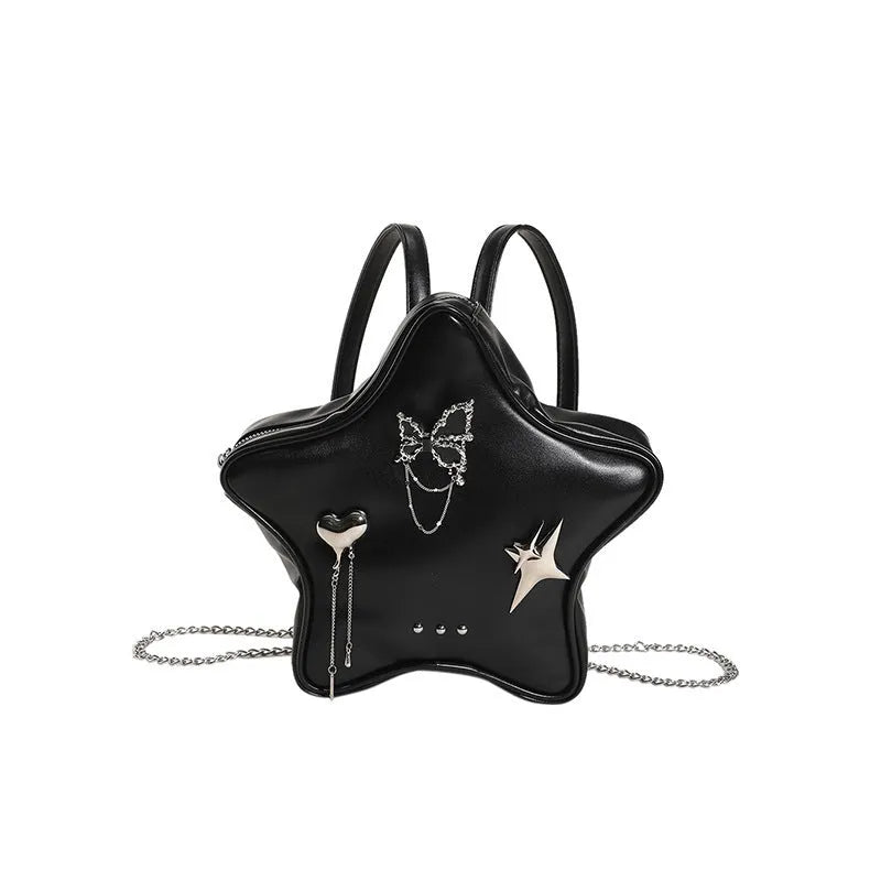 Black PU leather backpack with metal butterfly pendant and chain accents showing three-dimensional pockets