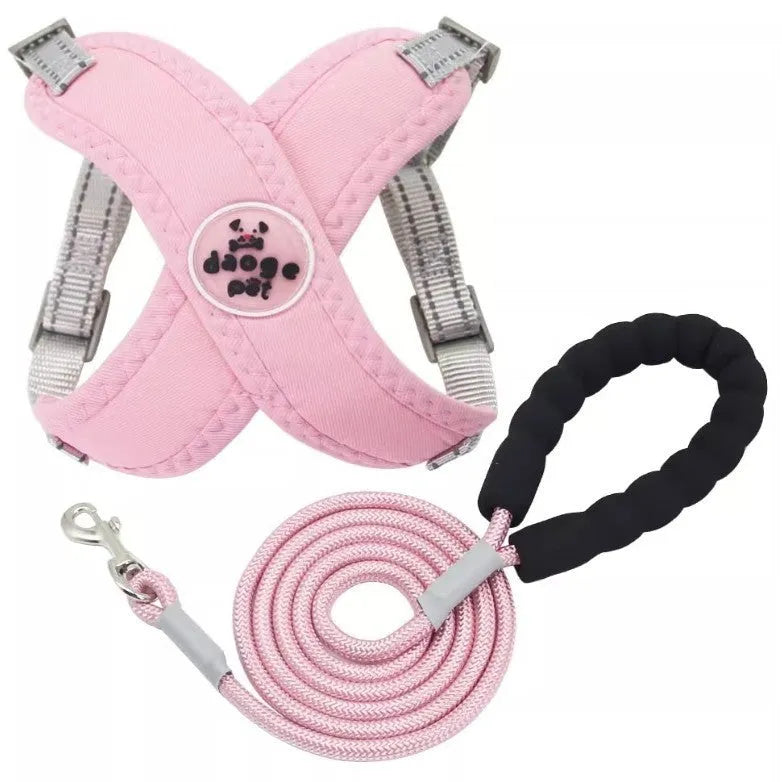 Polyester dog vest and matching hand holding leash in blue, green, pink, or yellow