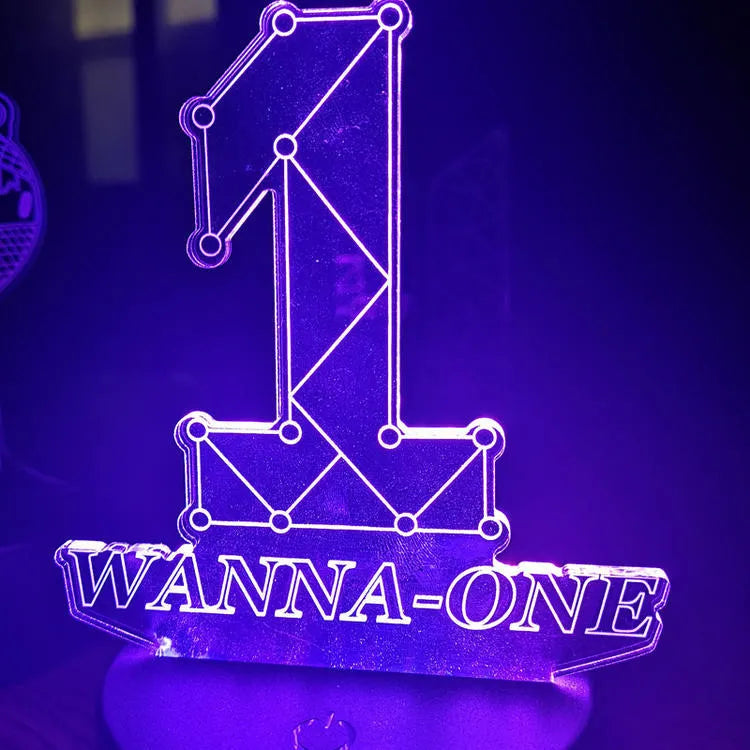 Transparent acrylic display stand showing illuminated BTS Light 101 Tower Gem collectible lamp.