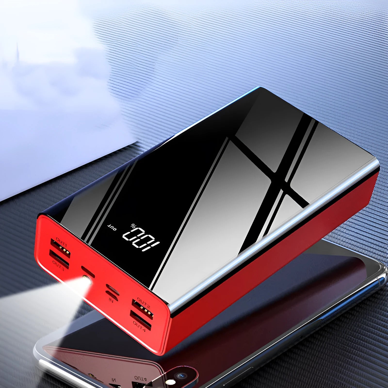 Large black or red 40000mAh power bank showing LCD display with plastic case.