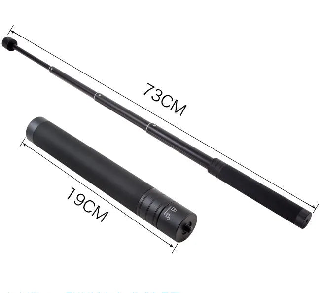 Black retractable selfie stick extended to full length with phone attached, showing detachable tripod legs and wireless remote.