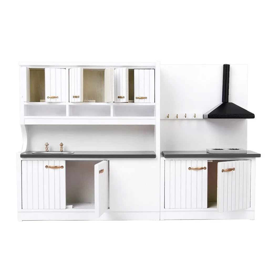 White two-piece dollhouse kitchen cabinets with working doors and metal handles on a birch wood body.