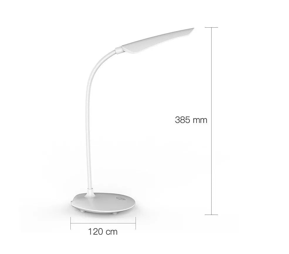 White LED desk lamp with USB charging cable, touch switch, and ABS shade on a desk