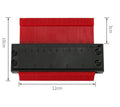 Orange 10-inch contour gauge with plastic teeth pressed against a pipe, creating a template for marking cuts
