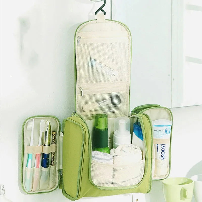 Travel waterproof cosmetic bag in ABS material, available in green, with zipper closure