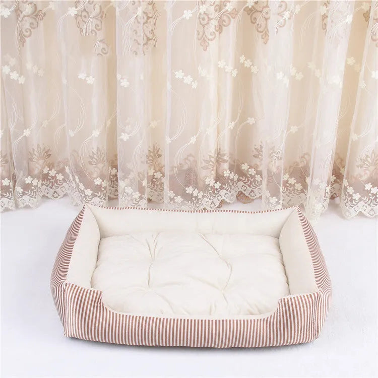 Round cloth pet bed for dogs or cats with a removable cover, shown in a striped colour pattern.