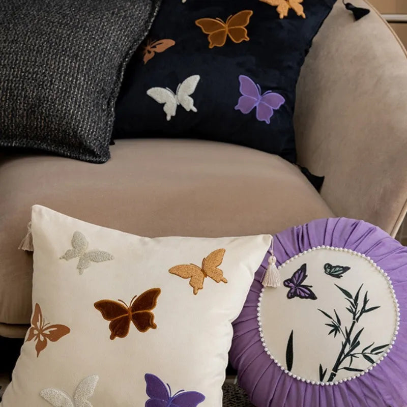 Square beige cushion with detailed Chinese-style butterfly embroidery, 45x45cm.