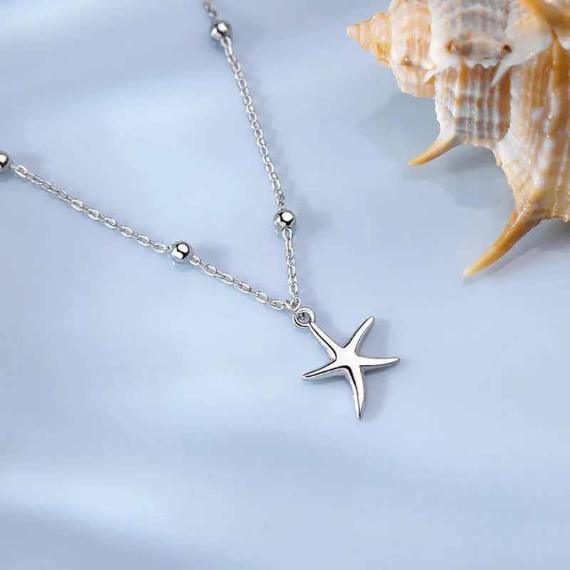 S925 sterling silver anklet with starfish charm and round beads.